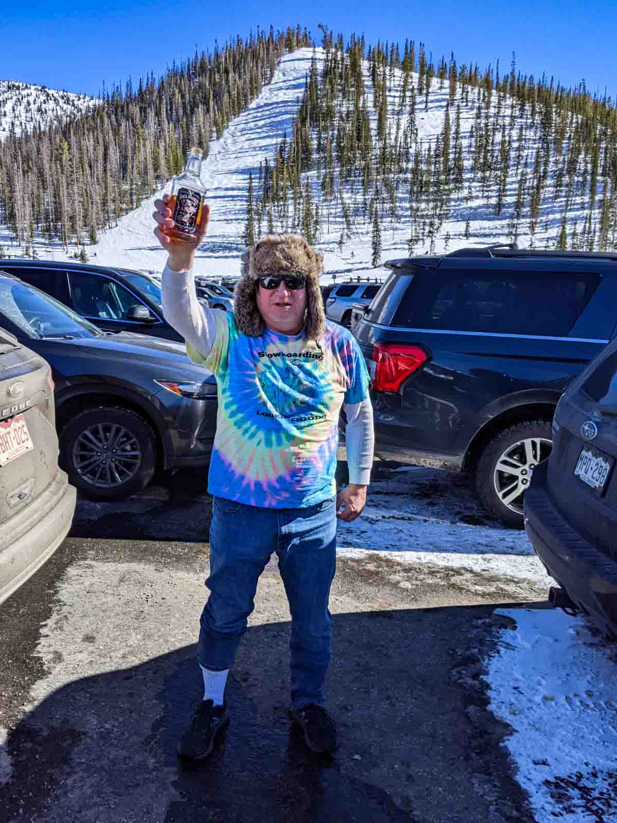 JD giving a whiskey toast to the Snow gods